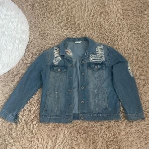 Distressed jeans jacket size large